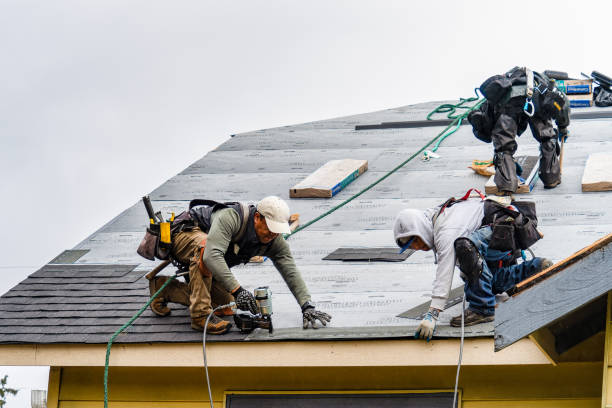 Professional Flat Roof Repair technician working in Tilton, NH